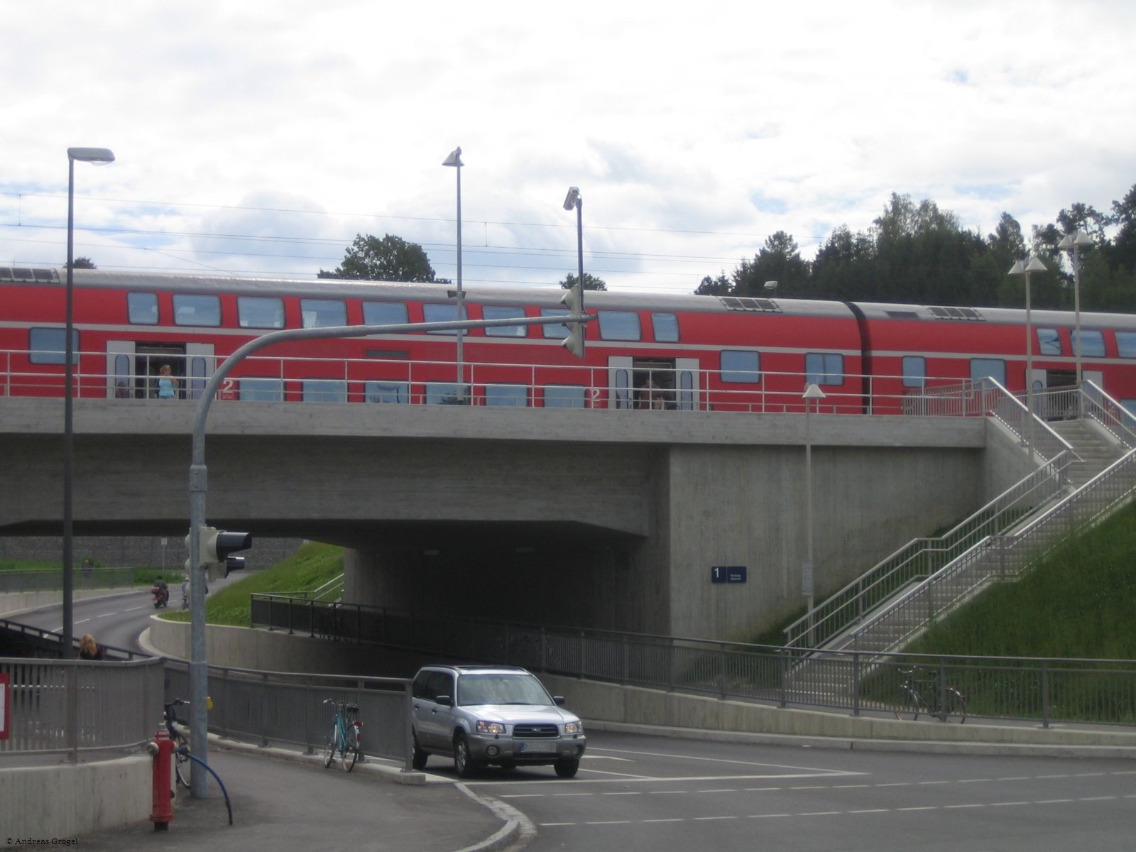 Railway station with regional train over new underpass